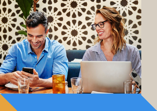 Image of two professionals smiling