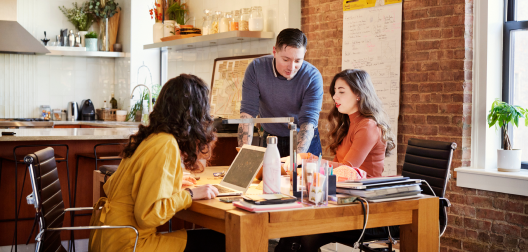 professional people talking at a desk